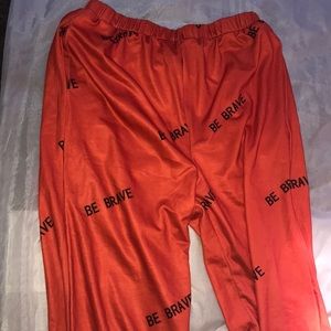 Orange sweat pants. Too tight.